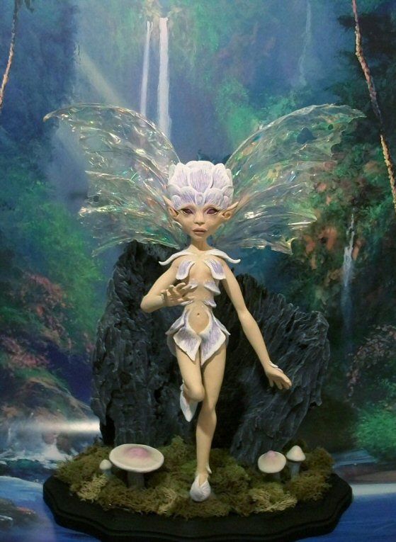 Orchid is an OOAK sculpt by detail artist John Linville.