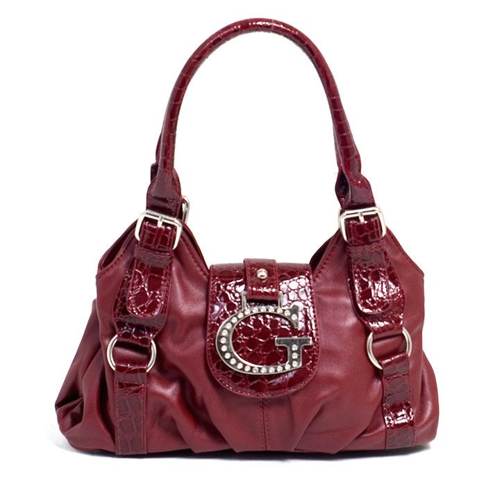 Stand out at a party with this lavish handbag made of soft, faux