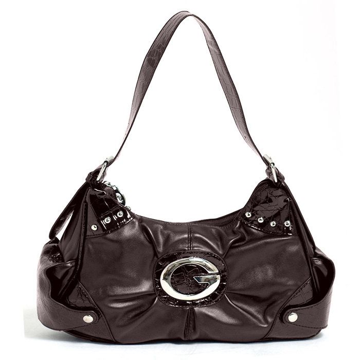 Stand out at a party with this lavish handbag made of soft, faux